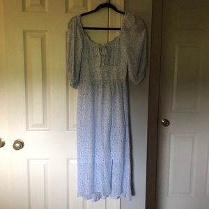 Calf-length blue and white floral dress